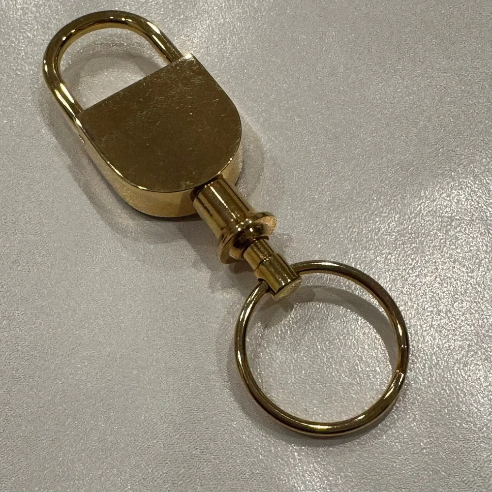 Gold Tone Lock Charm‎ Keychain With Embossed Logo